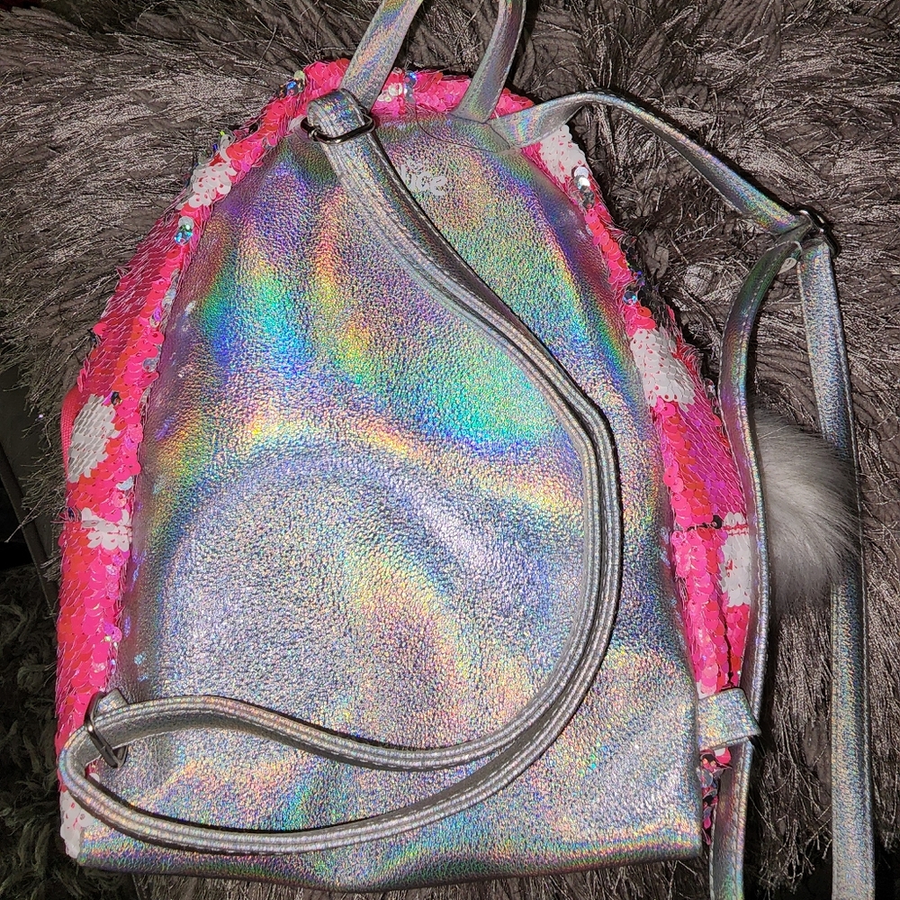 Girls purse/ back pack PINK,,SILVER,WHITE. in color